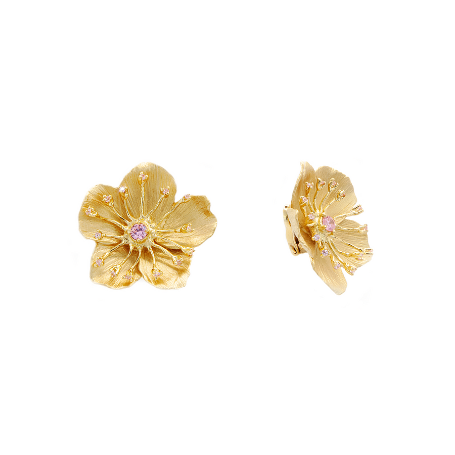 Made of sterling silver, plated in gold, these handmade beauties are designed as fully bloomed cherry blossom flowers with delicate gold lines crowned with precious stones.