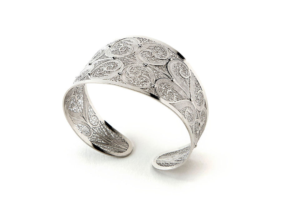 Handmade | Sterling silver protected in rhodium to increase durability and finish | Size adjustable (one size fits all)